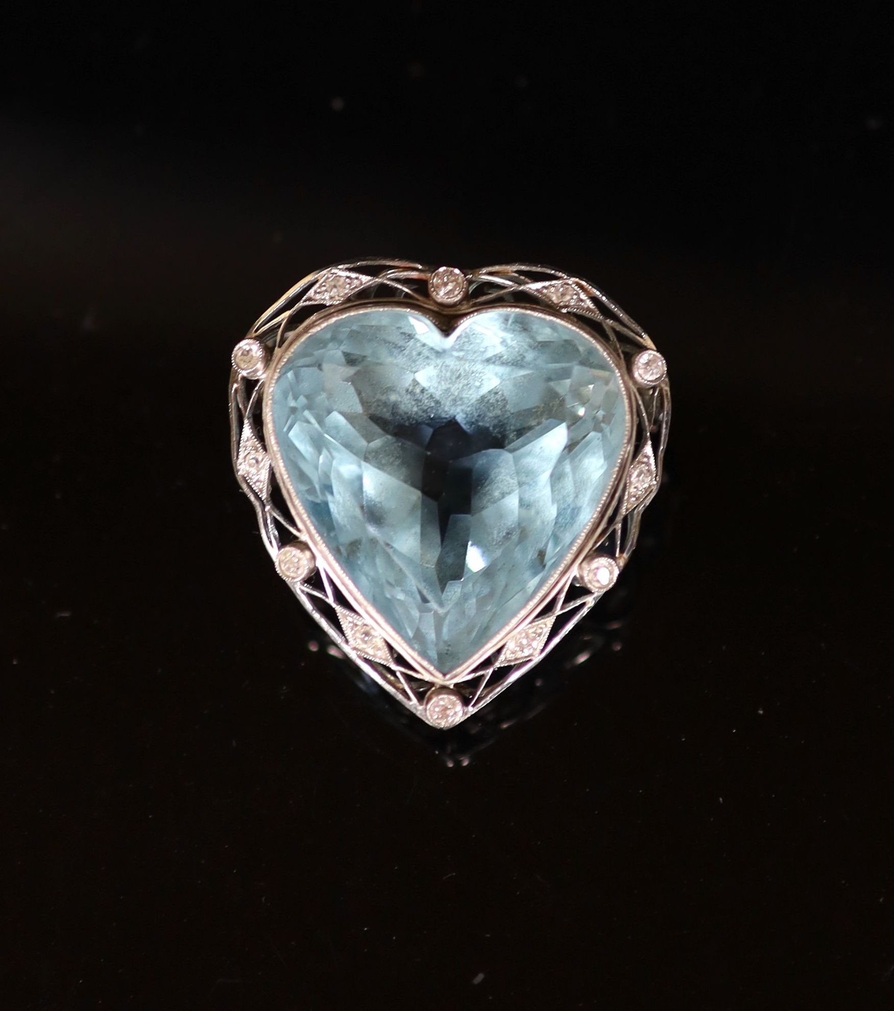 A white gold mounted heart shaped aquamarine and diamond set clip brooch